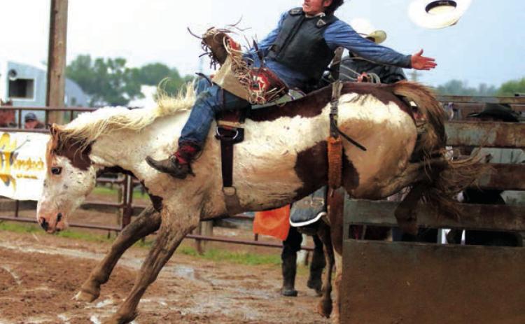 Jhett Knight of Dupree competes in bareback riding during the Dupree Pioneer Days Rodeo in June. Photo by Jon Flatland