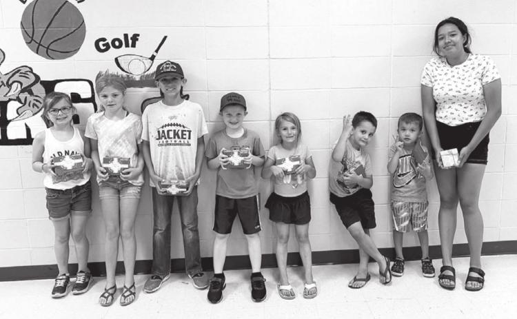 Prize drawing winners who met their AR goal: (L-R) Stella Nilson, Alexa Roggow, Emmett O’Leary, Liam Handeland, Joslyn Goldade, DW Scholtz, Bryson Long, and Kessa Bigger. NOT PICTURED: Barrett Maciejewski and Kamee Mareska