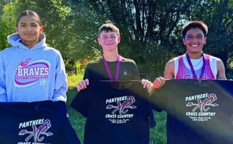 Top varsity boys finishers at the Timber Lake Cross Country Invitational last week were, l-r, Jackson Taken Alive, C-EB; Michah Reede, Lemmon; and Demetrius Sanchez-Gonzalez, C-EB. Photo by Mary Farlee