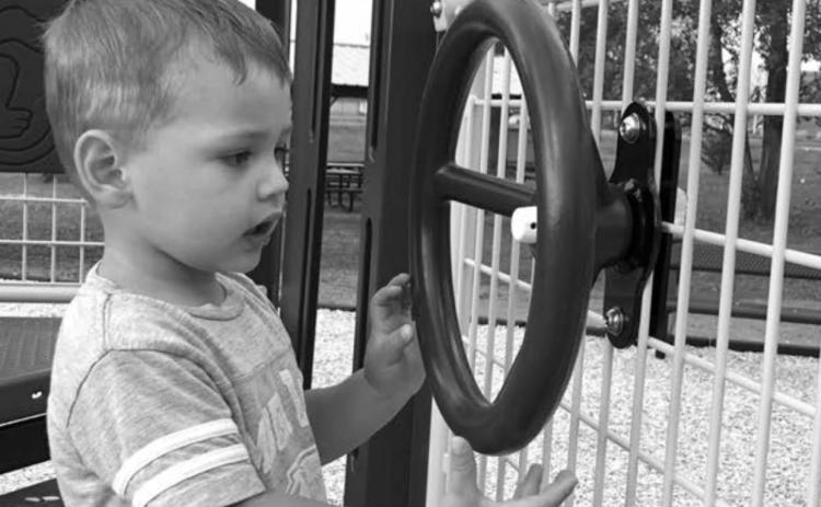 Zeke Vogel finds the new playground at the Timber Lake City Park highly entertaining. He and his brother Korbin visit often.