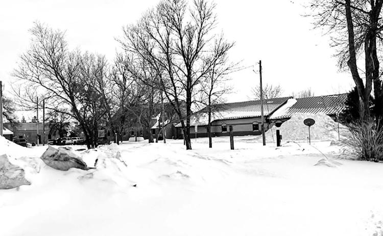 Two snow-covered lots at the corner of Sixth and F Streets (north of Holy Cross Church and the St. Joseph Center) will be the site of the Dakota Plex apartments.