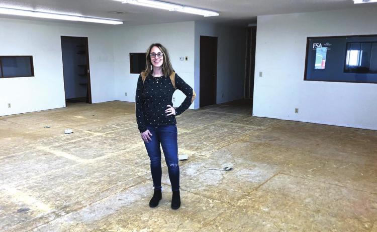 ABOVE: Kasey (Bickel) Maher is eager to start the next phase of renovations in the building she and her husband Patrick recently purchased. It will house her coffee shop and several other small businesses.