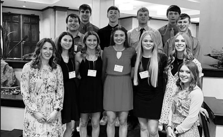 The TLHS Student Council at the state convention. FRONT (L-R) Colette Schaffer (advisor), Natalie Lawrence, Carlie Lawrence, Shay Kraft, Hailey Roggow, Averie Marshall, Kenlea Heck; BACK: Dan Peterson, Wylee Keller, Cole Ducheneaux, Treyton DuPreez, Rance Martin, Holden Gill.