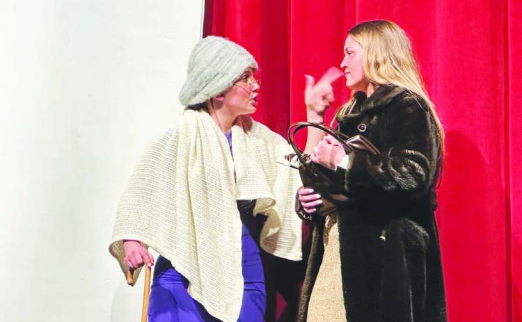 McKenzi Vomacka (left) as Professor Vivian Strict has a word or two for Kate Biegler (Davina Arlington) in “The Alibis.”