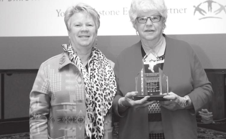AT RIGHT: Beverly Birkeland with her Legacy of Leadership Award, with Moreau-Grand Manger Melissa Maher (LEFT).