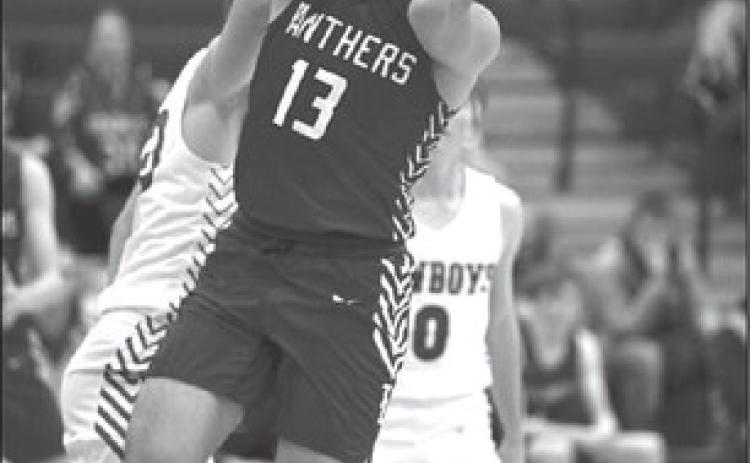Panther forward Aidan Rough Surface puts up a running jumper during second round action of the LMC Tournament against Lemmon last Friday, Feb. 2. Rough Surface finished the game with a season-high 20 points. Photo by Marie DuPreez
