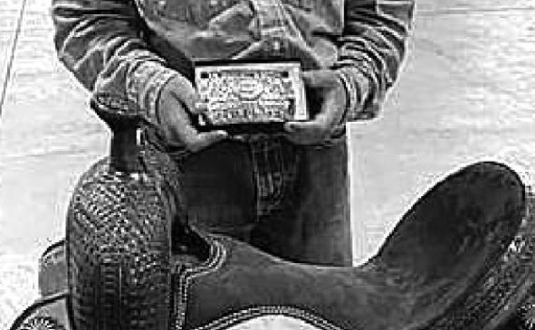 Pete Maher of McLaughlin/ Timber Lake won the State 4-H Championship saddle in junior boys goat tying.