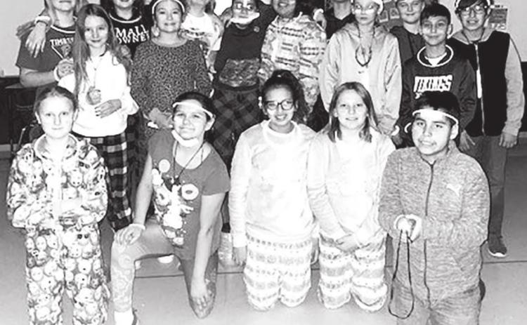 Here is a picture of the entire 5th grade class during our 2/22/22 “Let’s Glow” party. FRONT (L-R): Evelyn Gill, Katie Ridl, Sequoia Taken Alive, Tristan Swift, Theo Taylor; BACK: Maddy Hermes, Ella Handeland, Katie Martin, Jalee Booth, Addison Lindskov, Selena LongBrake, Aj Red Fox, Brayzin PayPay, Levi Berndt, Braxton Farlee, Evan Schweitzer, Camden Ley, Dayson Schumacher.