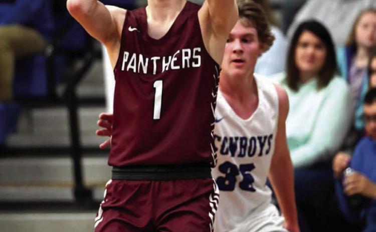 Timber Lake senior guard Kody Keller puts up a baseline jumper during the Region 8B SoDak 16 qualifier last week against Lemmon. The Panthers avenged two losses to the Cowboys this season with a 54-53 win, moving them to the state tournament qualifier. Photo by Marie Du Preez