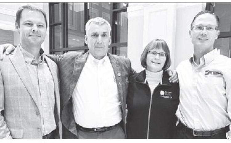 TLHS grads, now co-op managers, meet at national REA conference