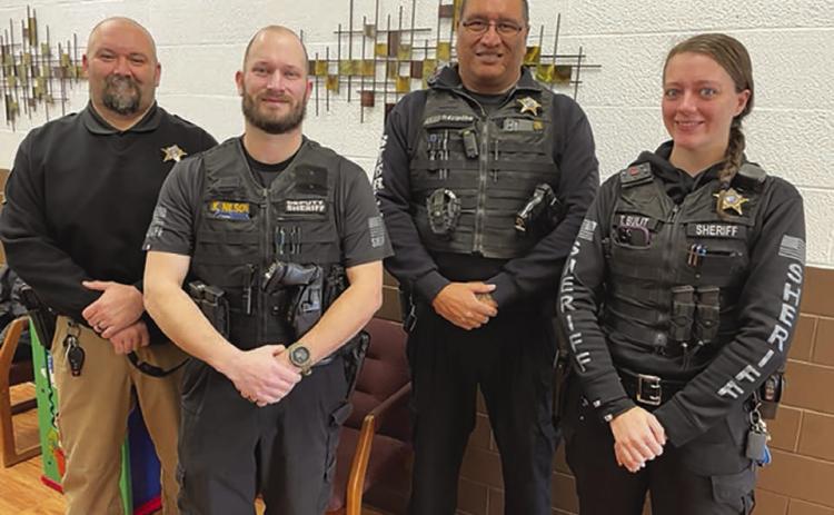 Among those taking the oath of office for 2023 were these four Dewey County law enforcement officers. L-R: Deputy Sheriff Jeff Ward, Deputy Sheriff Kyle Nilson, Sheriff Ash Arpan, and Deputy Sheriff Trista Bulit. Photo by Kathy Nelson