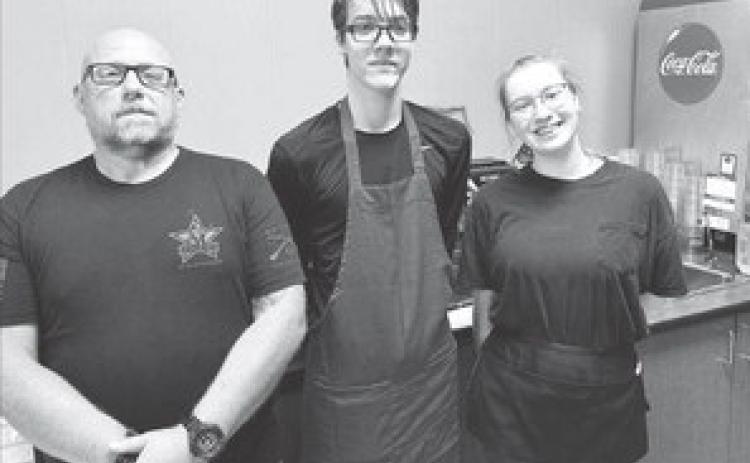 New Management The as-of-yet-to-be-named cafe in Timber Lake, or the former R Rockin Bar which was recently purchased by a group of local investors, has a new manager. Jeremy Holien of Firesteel has been hired as manager and will be assisted in the operation by his children, Parker, 20, and Elena, 18. Not pictured is Spencer, 16. The cafe is open 6 a.m. to 2 p.m. Monday through Saturday. The new phone number is 605-865-3293.