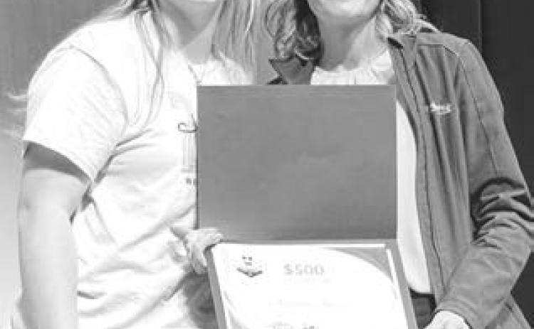 Jordan Jones (left) received a $500 Scholarship from Buche Foods and Team Buche Cares. Buche Foods owns stores in Gregory, Mission, Pine Ridge, Oacoma, Sisseton, Wagner and most recently Mobridge (formerly Payless Foods).