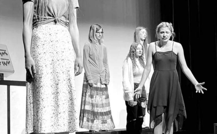 The automated figures begin to come alive. L-R are Natalie Gross, Kendal Lemburg, Maddie Bieber, Averie Marshall and Natalie Biegler.
