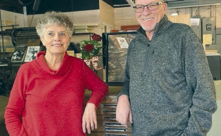 Longtime Topic publisher Kathy Nelson with new owner Jon Flatland. Nelson is semi-retiring after 42 years as publisher. Flatland has more than 30 years experience and has been with the Topic as staff writer and sales manager since fall of 2019.